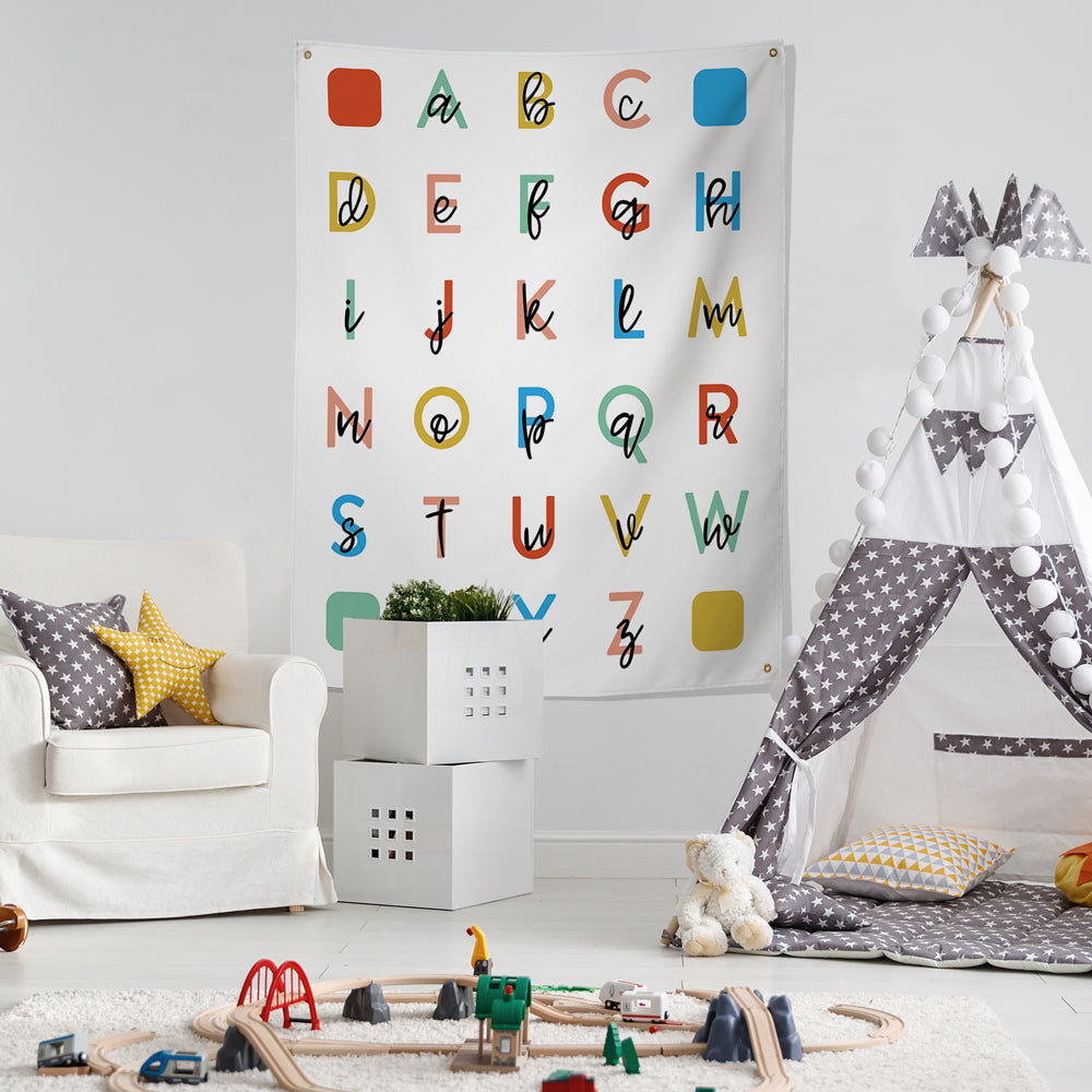 large alphabet wall hanging in child's playroom 